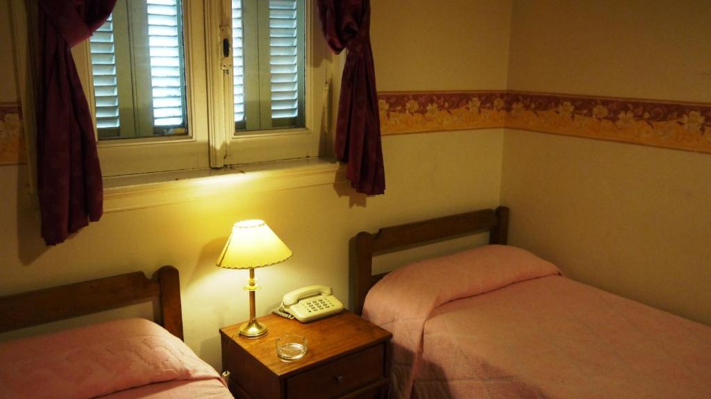Hotel Gran Sarmiento Buenos Aires Kamer foto